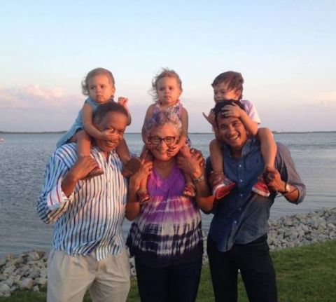 Susan Delise and Juan Williams playing with their grandchildren